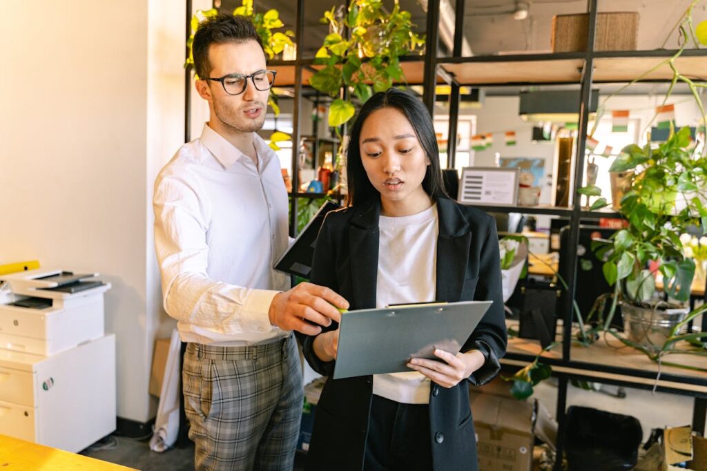 man and woman discussing inventory